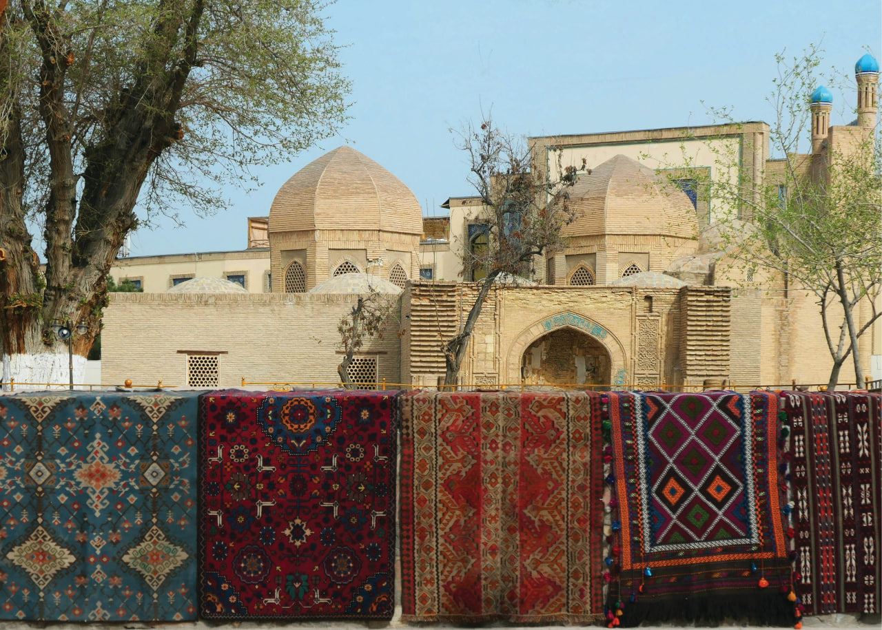 Local people walking through the historic streets of Bukhara.