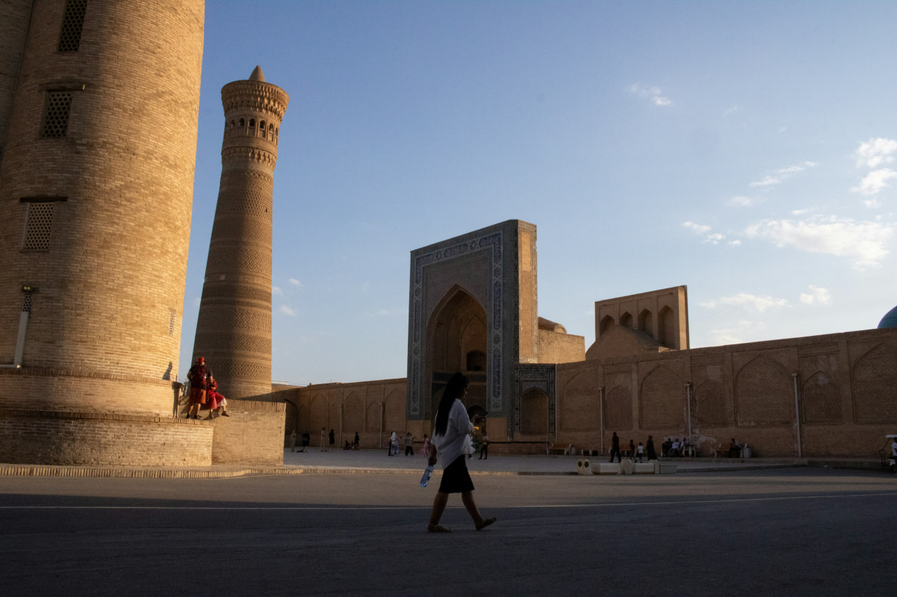 Sunset glow on ancient walls and monuments of Bukhara.
