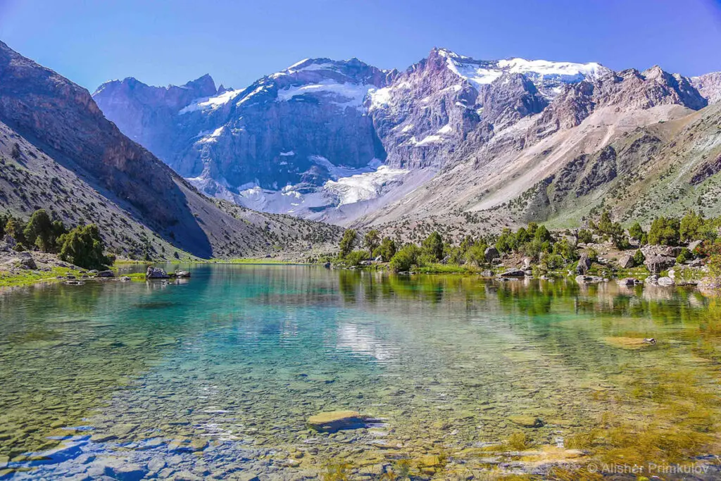 Panoramic landscape of the Fann Mountains with deep blue lakes, Tajikistan.