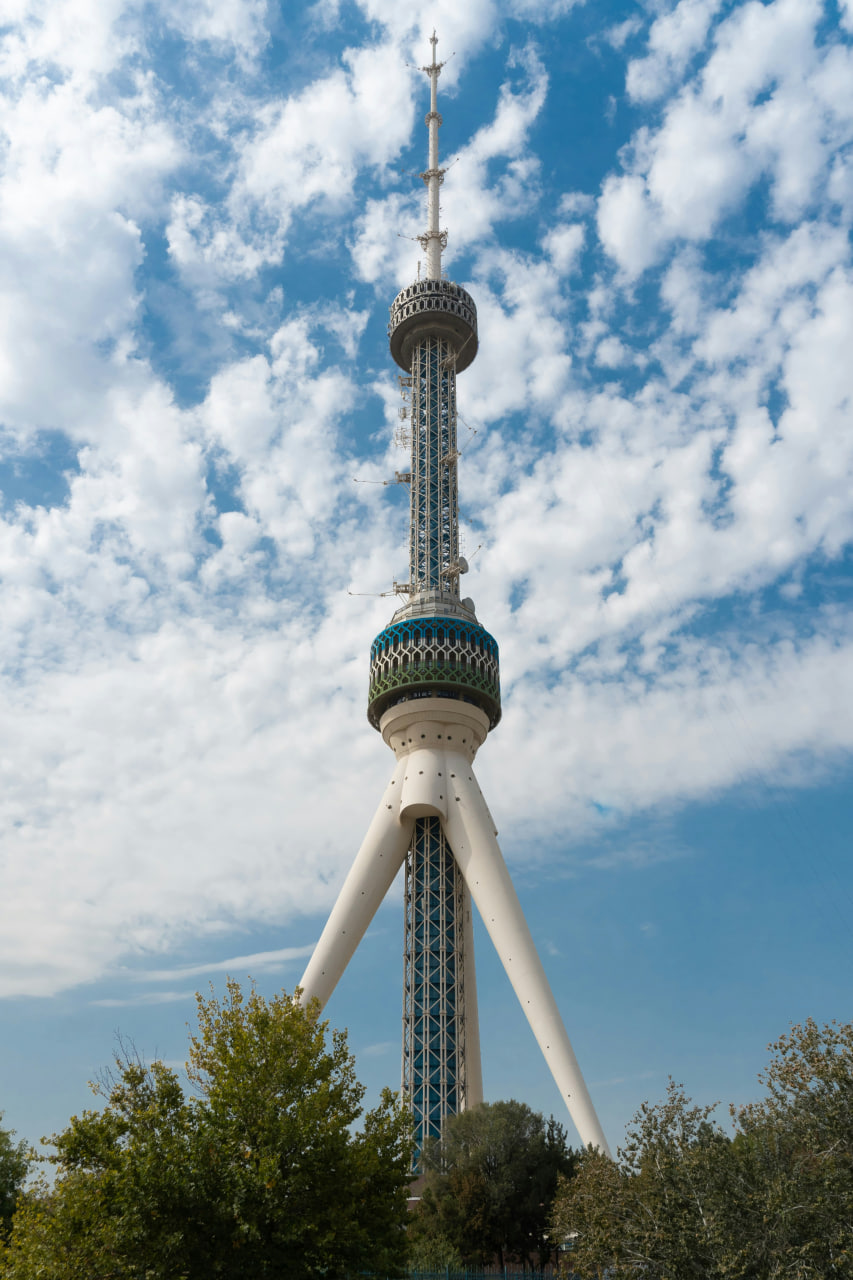Modern skyline of Tashkent with shining evening lights.