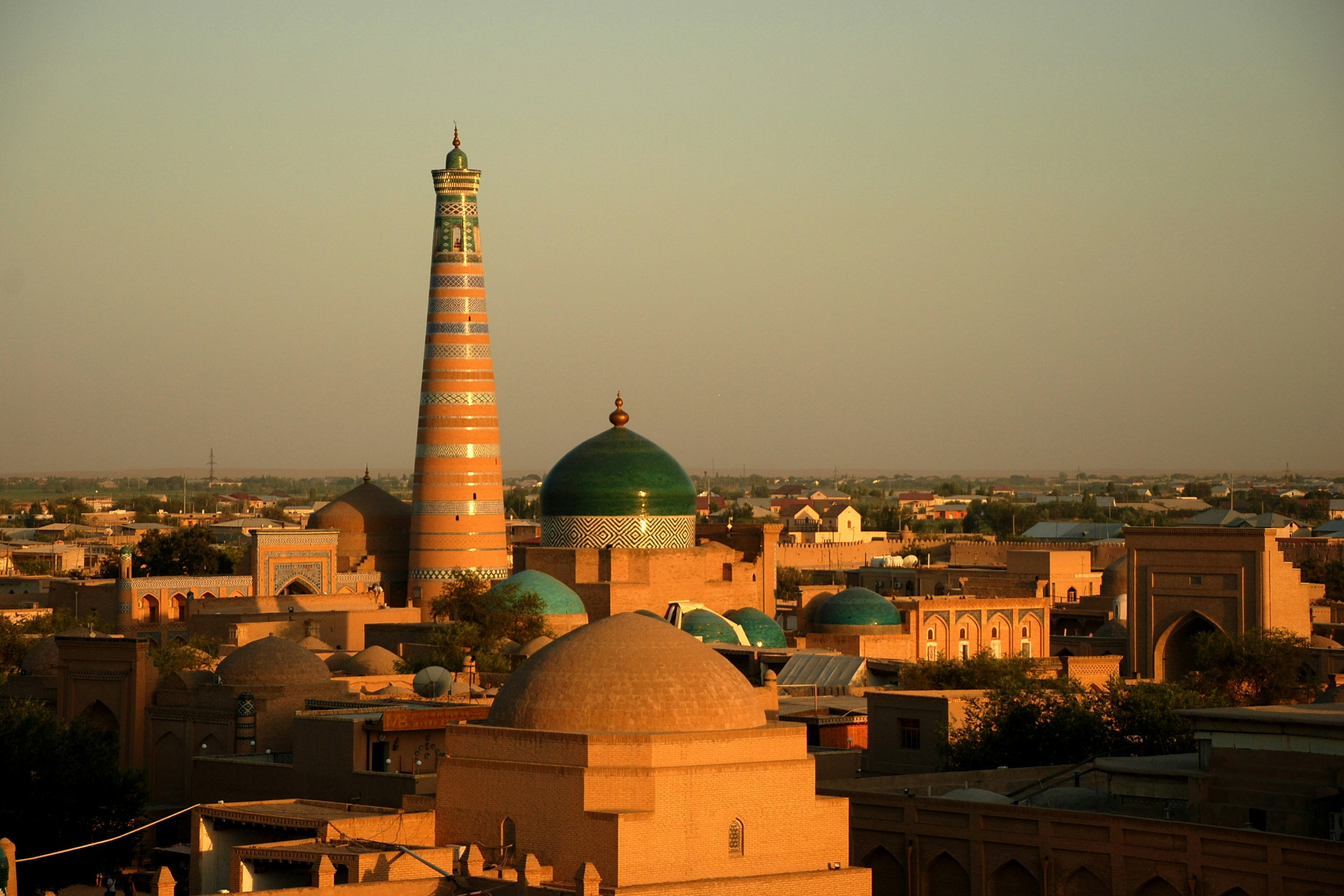 Golden hour over Khiva's domes and minaret