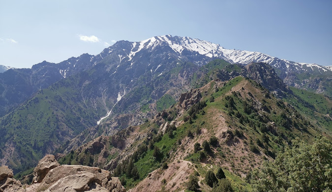 Mountain biking trail in Chimgan with panoramic views.