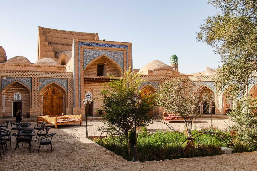 Explore former madrasa buildings on guided Khiva city tour