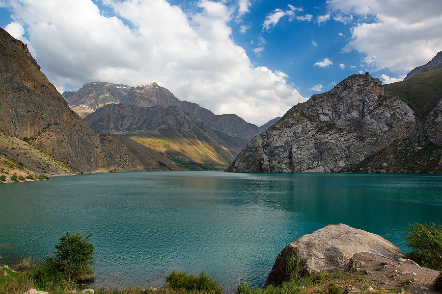 Serene morning mist over Marguzor Lake in the heart of Tajikistan's nature.